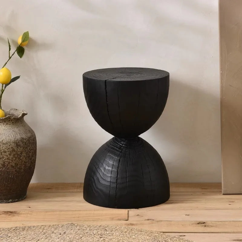 Handcrafted, wooden side table with hourglass shape in black finish
