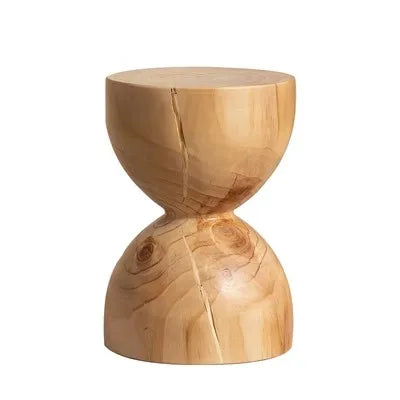 Handcrafted, wooden side table with hourglass shape in natural finish on white background