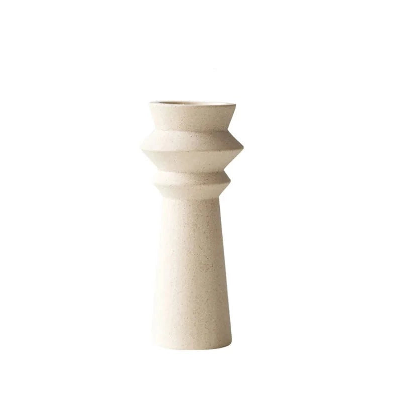 White ceramic candle holder on white background