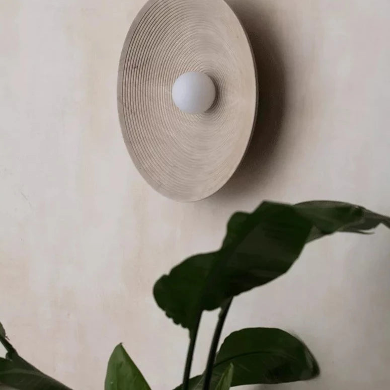 Round Japandi wall lamp in neutral color background