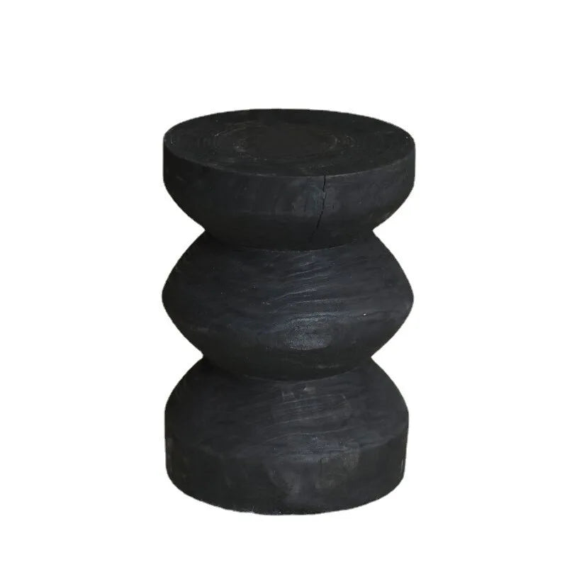 Handcrafted wooden side table with zigzag design on white background