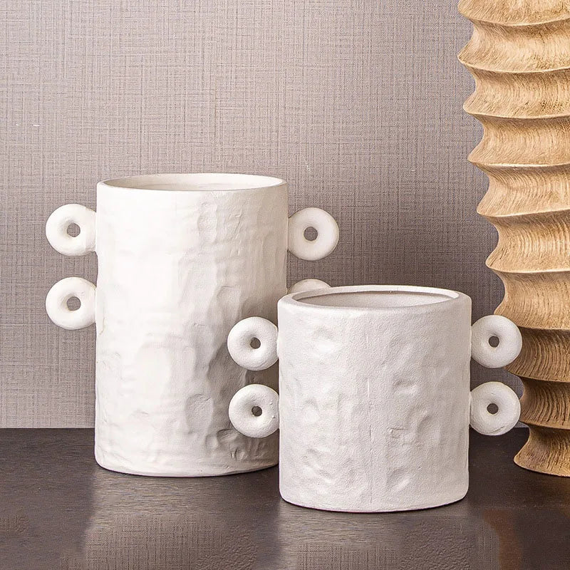 Set of two white textured ceramic planter with round details on sides