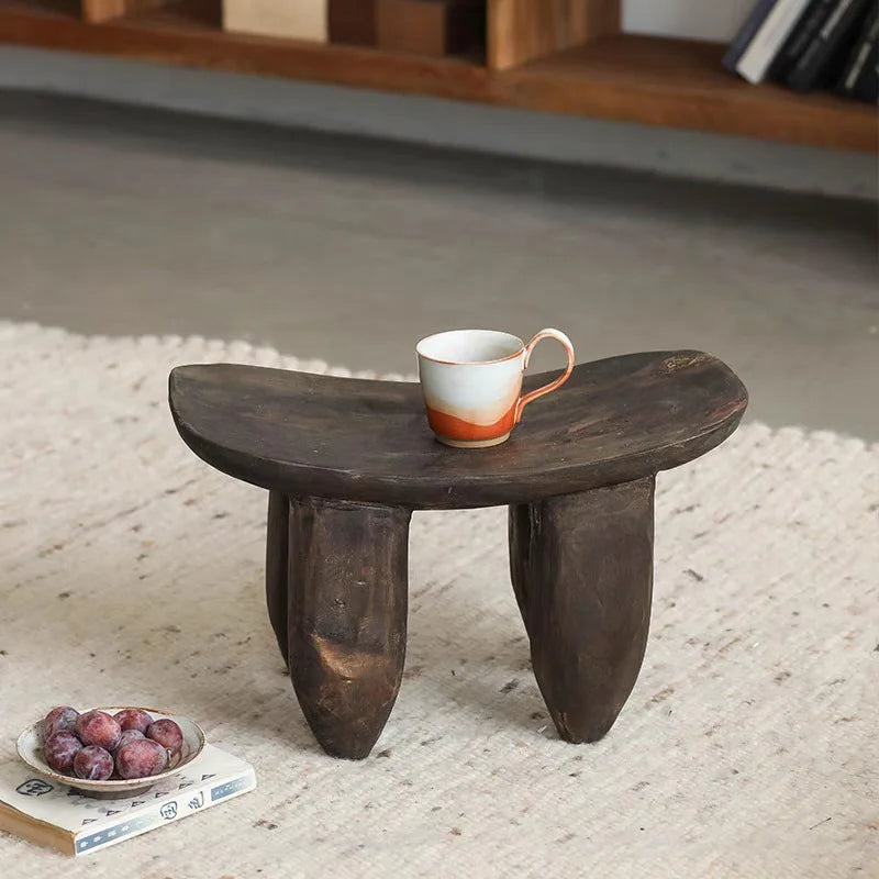 Japandi wooden stool and mug in neutral room