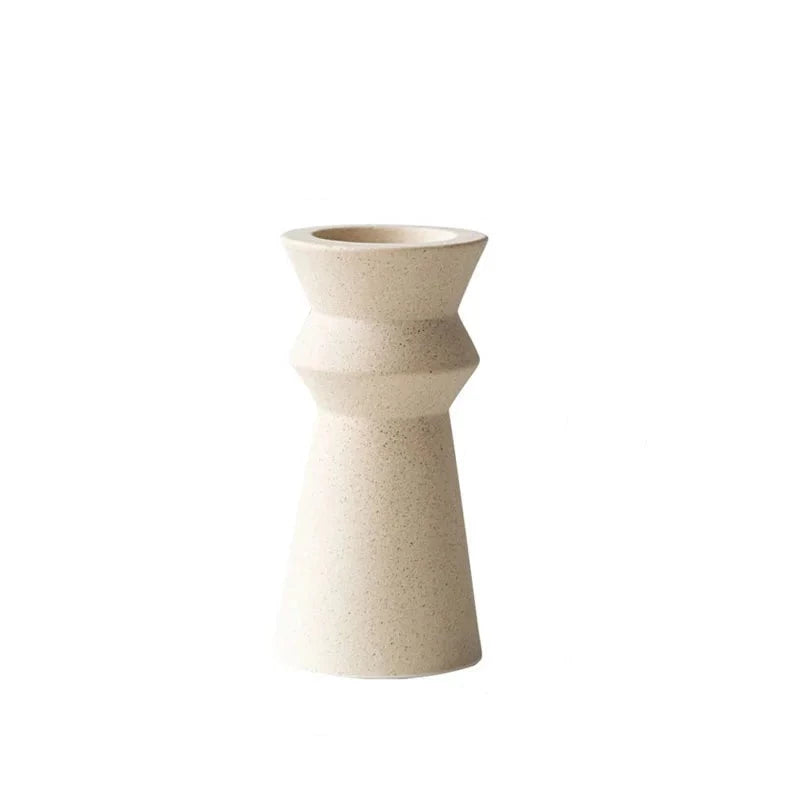 White ceramic candle holder on white background