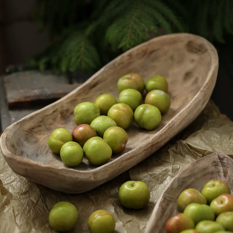 Japandi wooden trays with plant and colored fruit