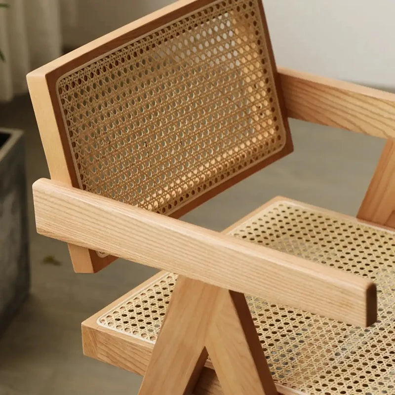 Detail of Japandi wood chair with rattan seat