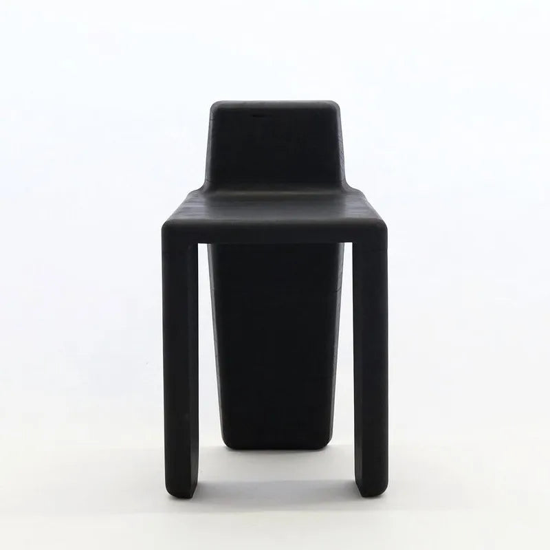 Frontal view of black Japandi wood chair on white background