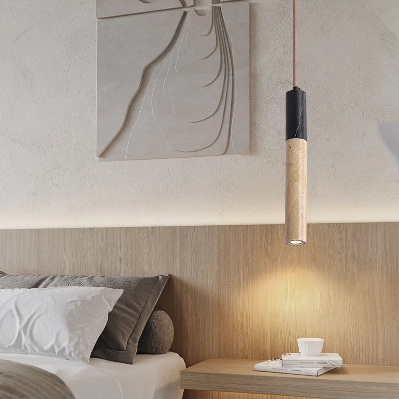 Travertine japandi pendant light hanging over bedside table in neutral color bedroom