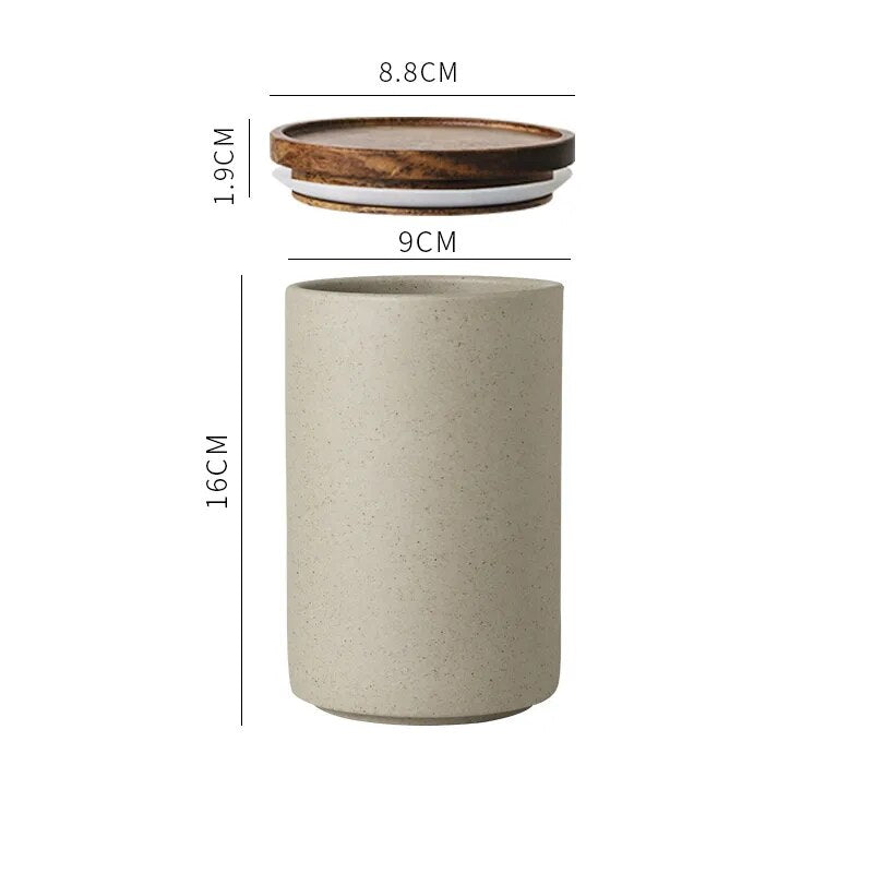 Dimensions of single grey ceramic spice jar with wooden lid on white background