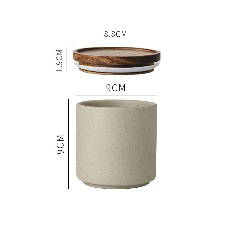 Dimensions of single grey ceramic spice jar with wooden lid on white background