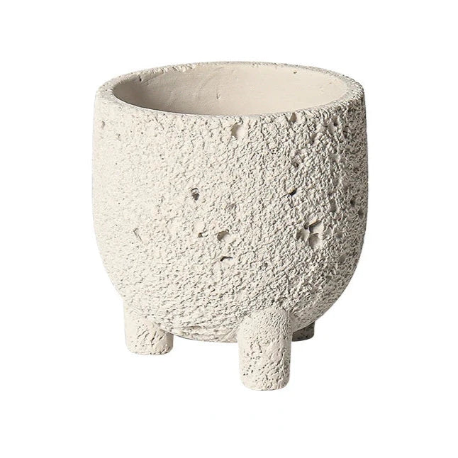 White textured planter with feet on white background